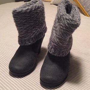 Wedge ankle boot with a grey sweater fold down.